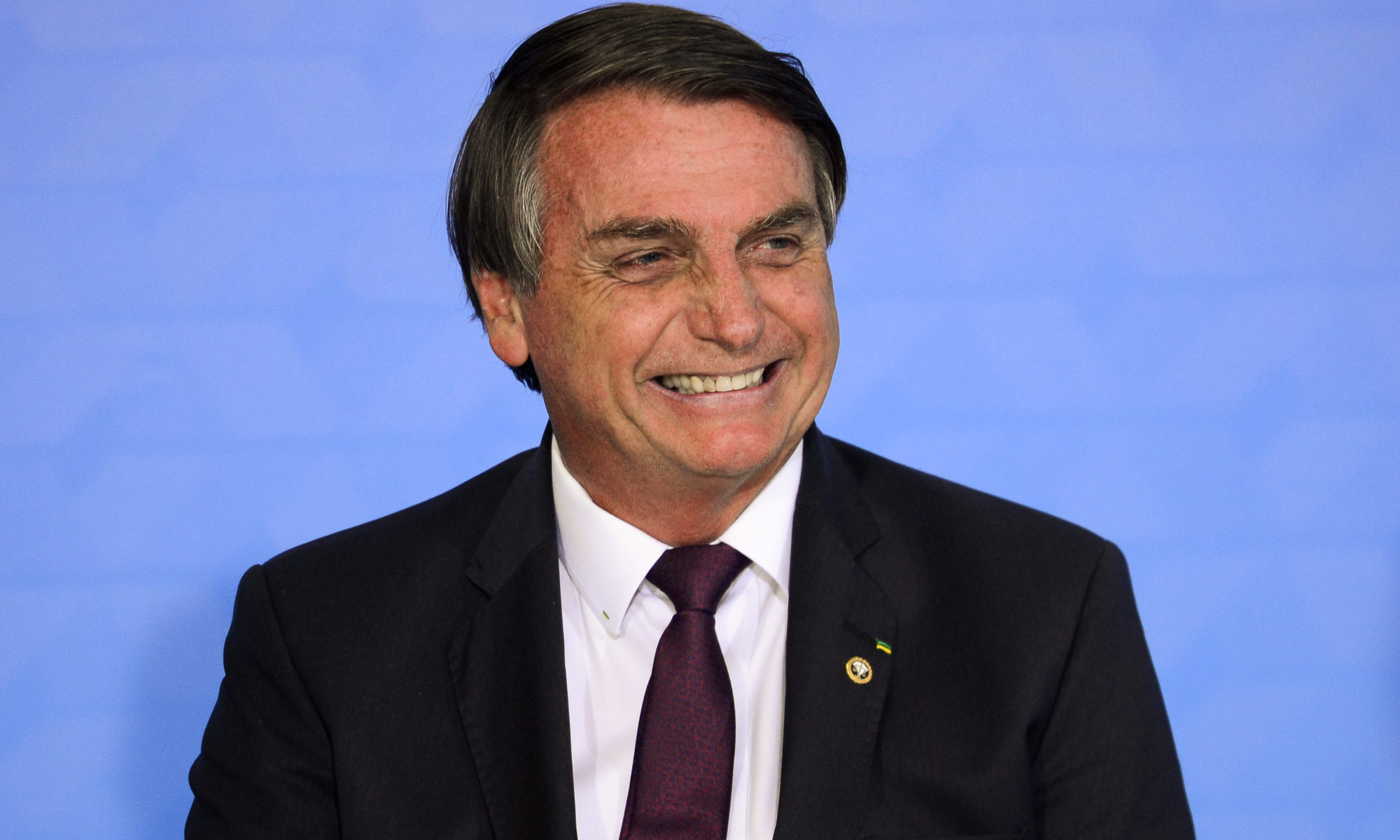 O presidente Jair Bolsonaro durante cerimônia alusiva à marca de 100 milhões de poupanças sociais digitais Caixa.